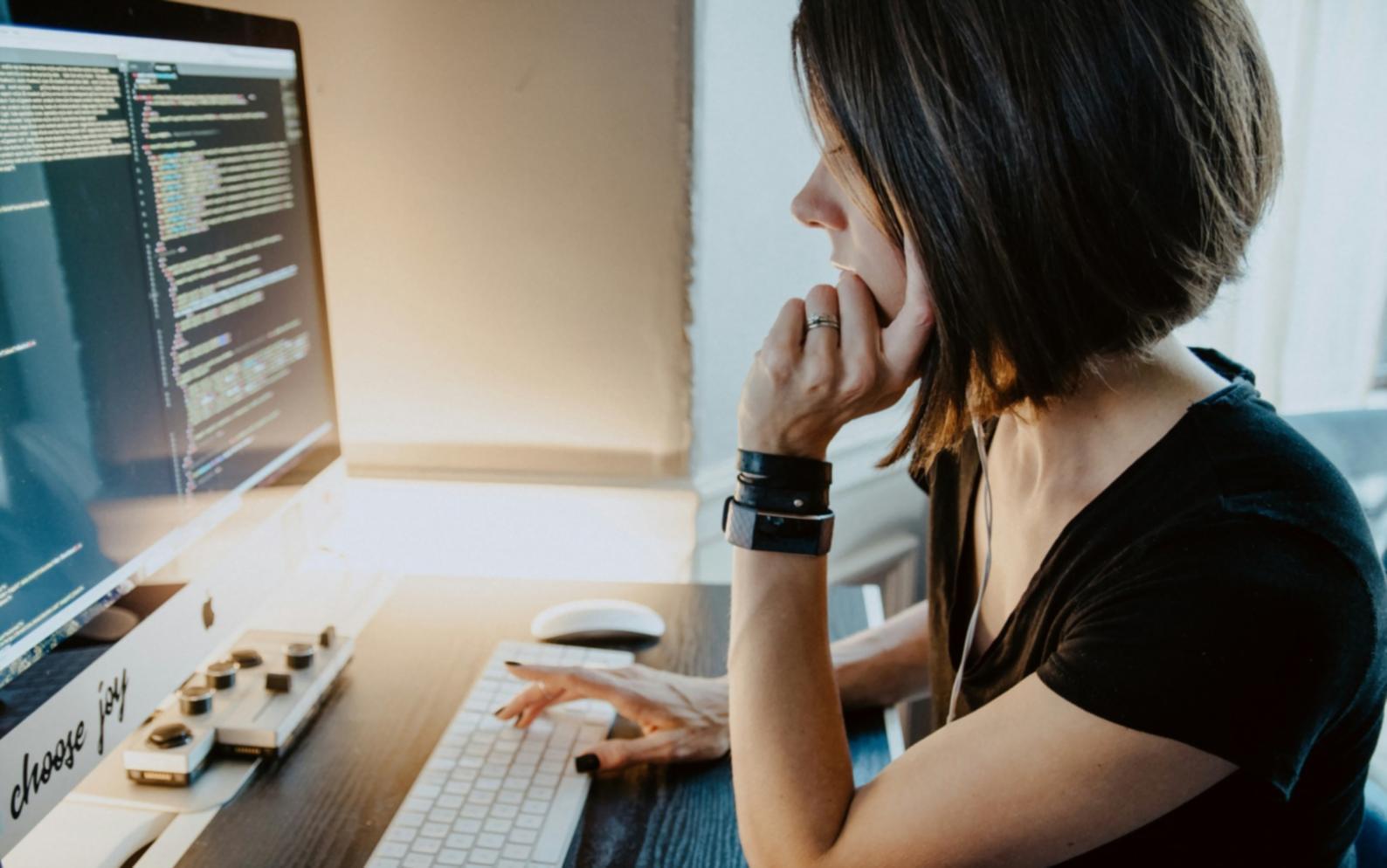 Professional analyzing financial spreadsheets and data visualizations